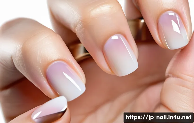 네일아트로 손톱길이 보정 방법 - A close-up, high-definition photograph of elegant, slender female hands with perfectly manicured nai...