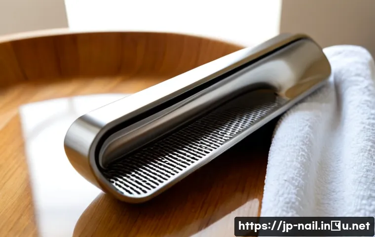 강력한 풋 파일 추천 - Photorealistic close-up of a premium stainless steel foot file with a broad abrasive surface resting...